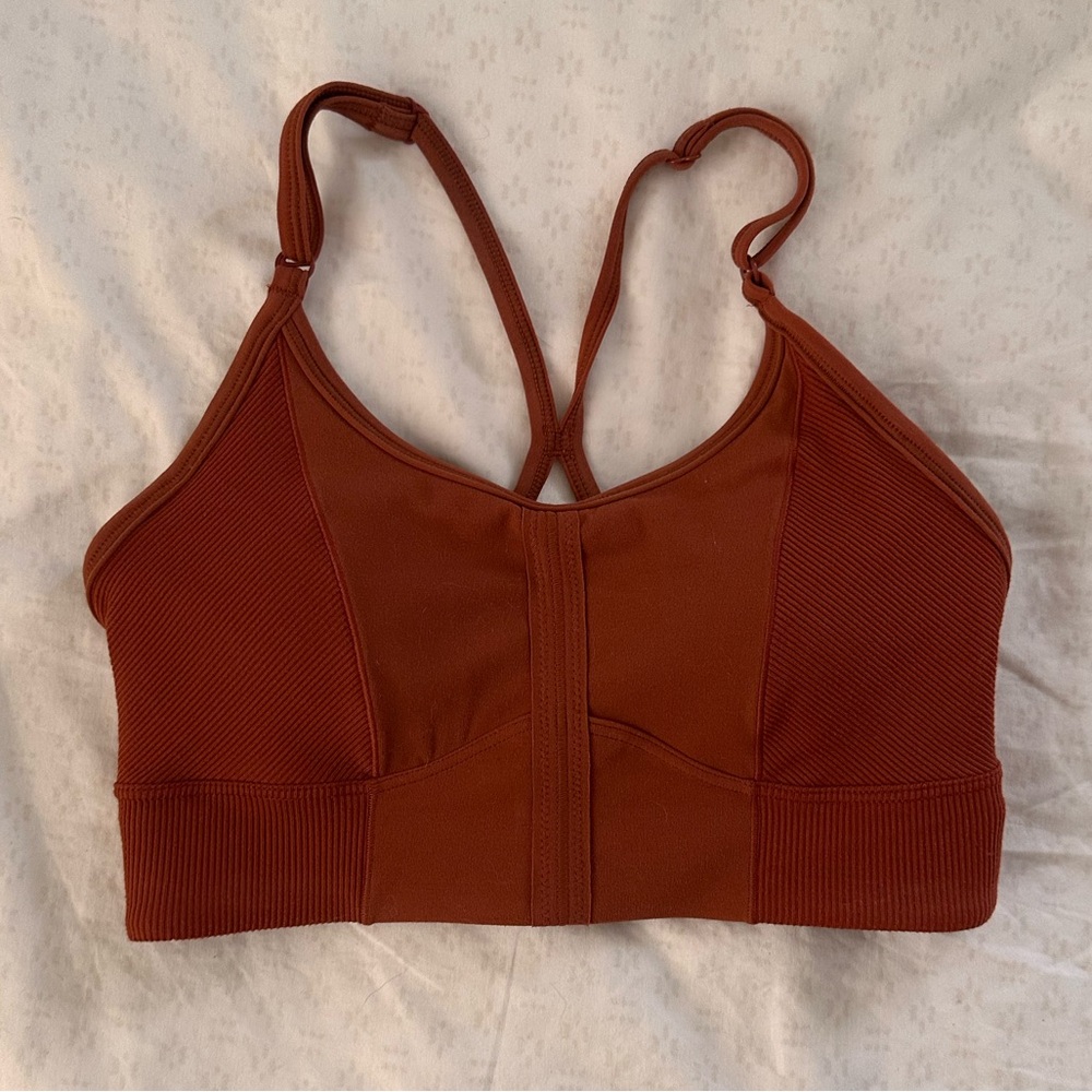 Nike sports bra orange/rust color.